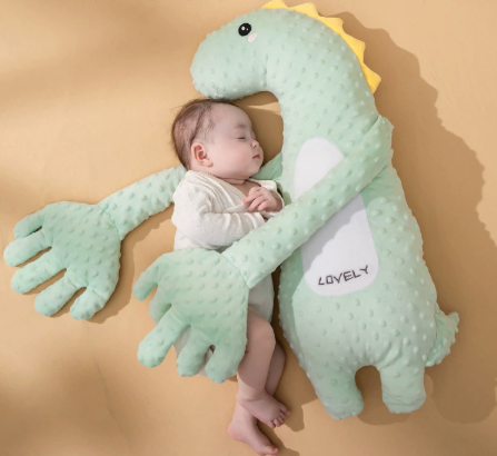 Detalle del peluche Palmadín™